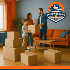 Decluttering moving boxes before a Tampa move with Speedy Hauling & Junk Removal logo, professional Tampa junk removal service