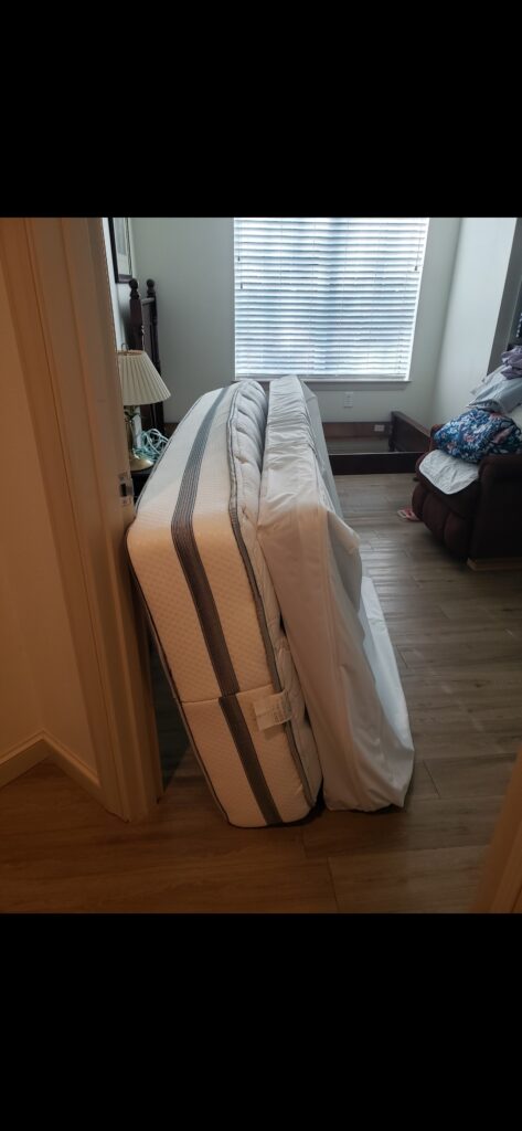 Mattress and box spring ready for pickup during a junk removal service in Tampa Florida