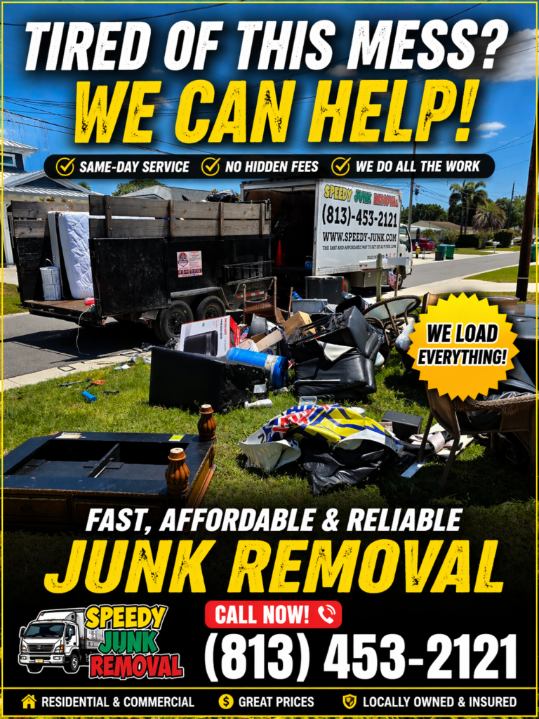 Junk removal truck in Tampa loading furniture and debris